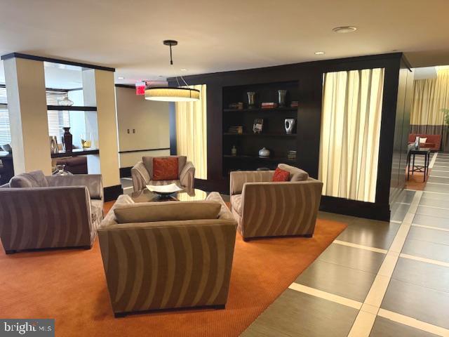 living room featuring tile patterned flooring