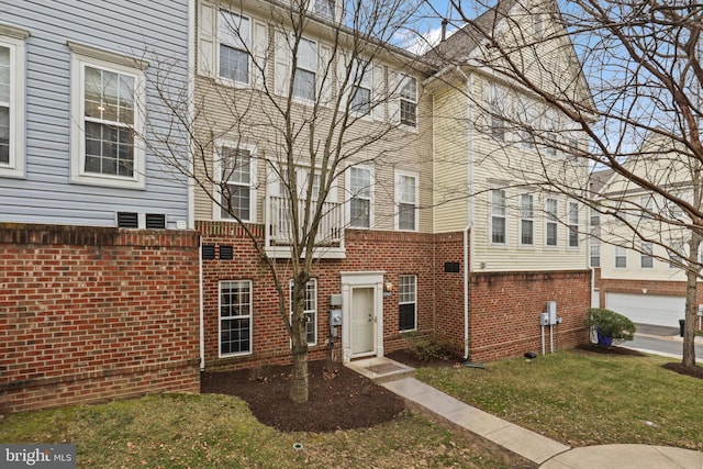 view of front of home with brick siding