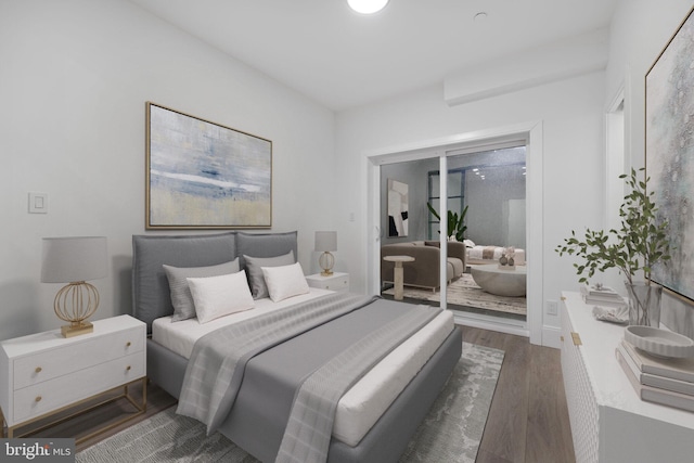 bedroom featuring wood finished floors