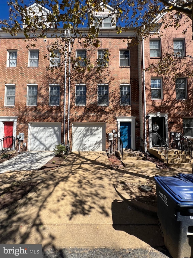 exterior space with a garage and driveway