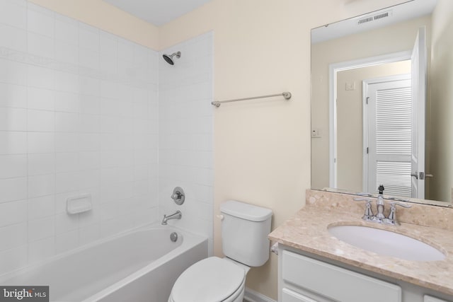 bathroom featuring visible vents, vanity, toilet, and shower / bath combination