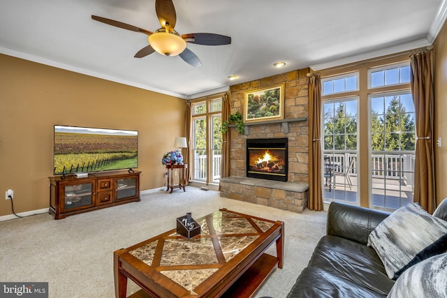 carpeted living room with a fireplace, baseboards, and ornamental molding