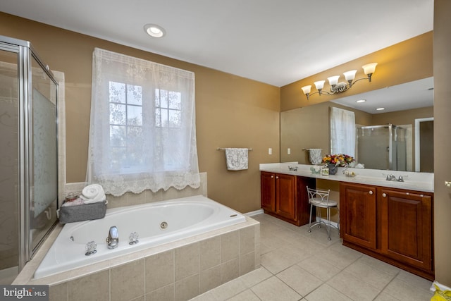 bathroom with double vanity, a whirlpool tub, a sink, a shower stall, and tile patterned floors