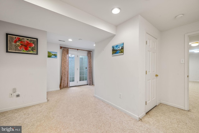 hallway featuring recessed lighting, baseboards, and carpet