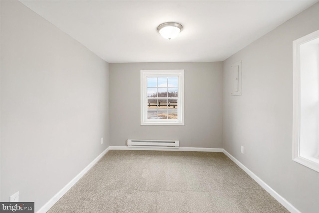 unfurnished room with carpet floors, baseboards, and baseboard heating