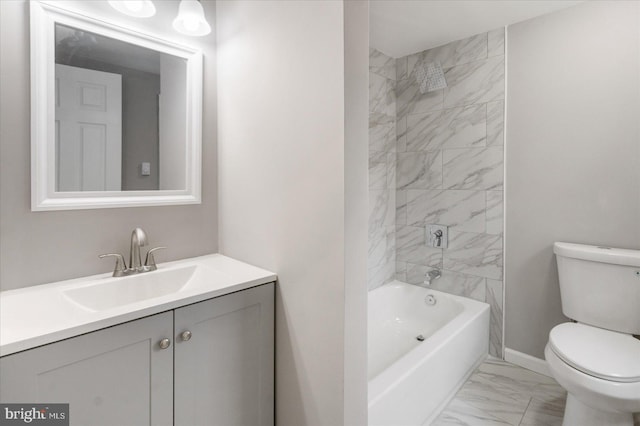 full bathroom with marble finish floor, shower / bathing tub combination, toilet, vanity, and baseboards