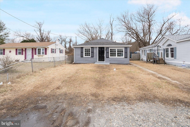 view of front of house with fence private yard and a front yard