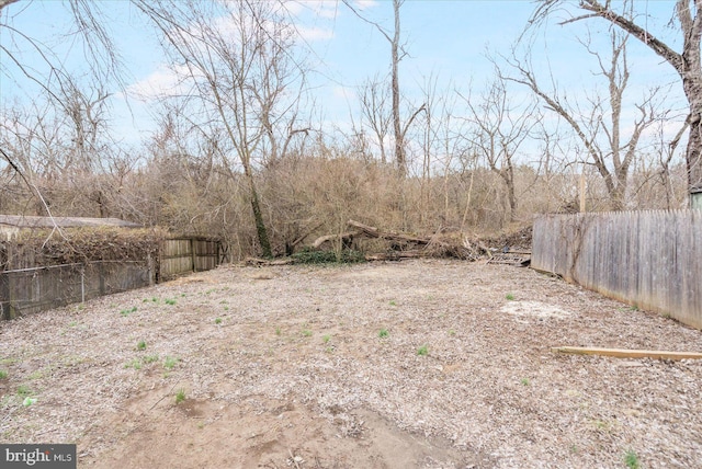 view of yard with fence