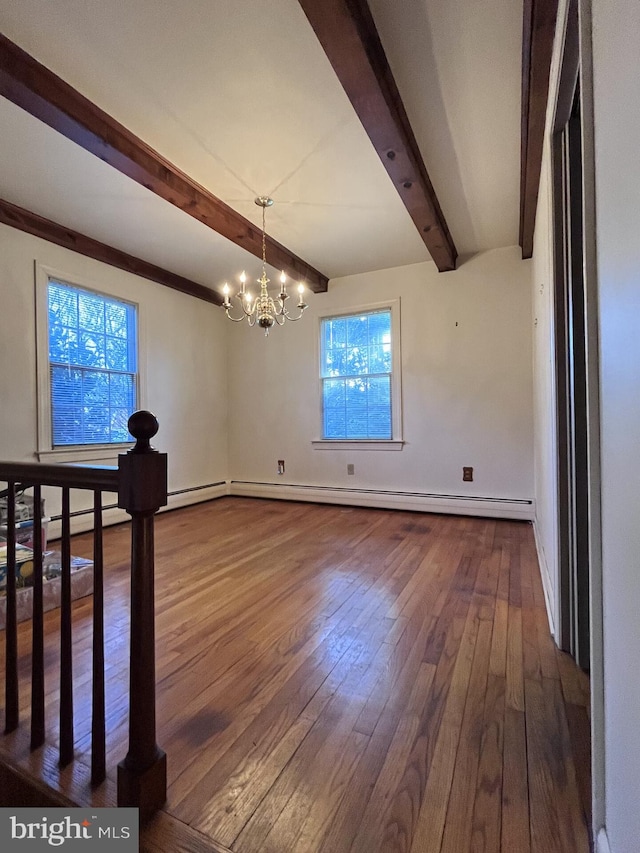 spare room featuring a chandelier, beamed ceiling, baseboards, and dark wood-style flooring