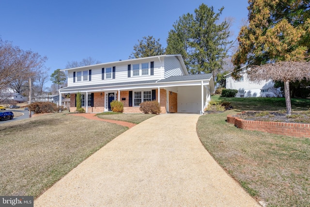 view of front facade with an attached carport, a porch, concrete driveway, a front lawn, and brick siding