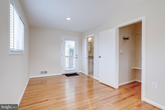 entrance foyer with recessed lighting, visible vents, baseboards, and light wood finished floors