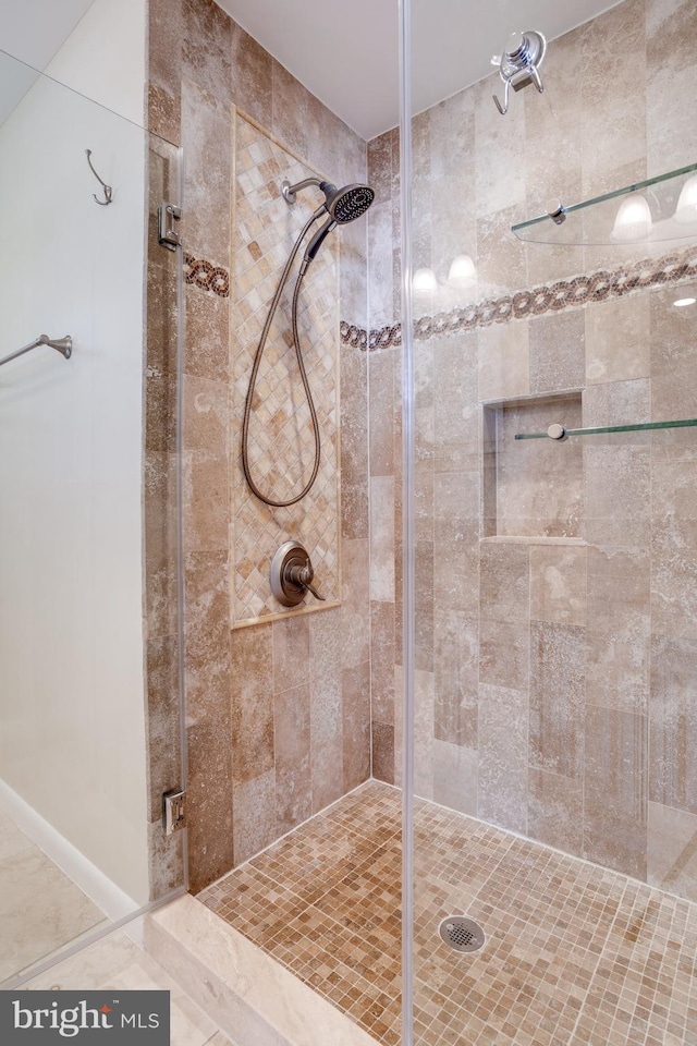 bathroom featuring a stall shower