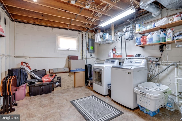 clothes washing area with laundry area and washing machine and dryer