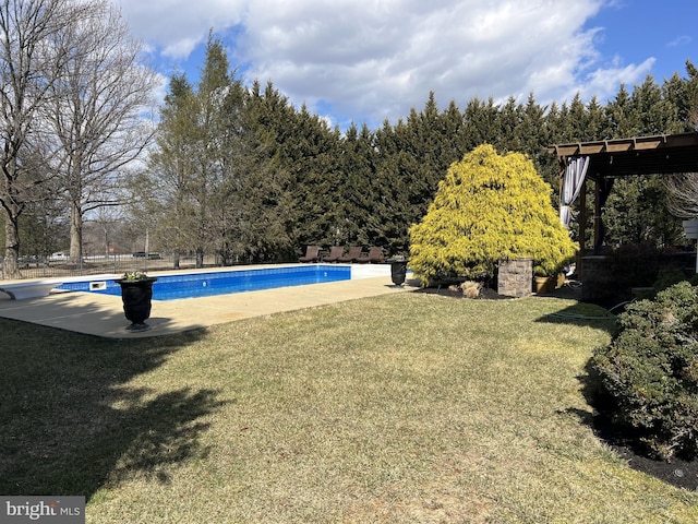 outdoor pool with a lawn