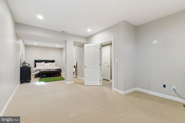 carpeted bedroom with recessed lighting and baseboards