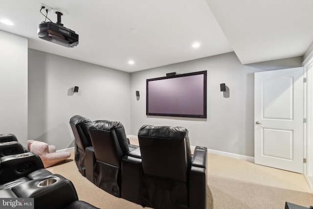 carpeted cinema with recessed lighting and baseboards
