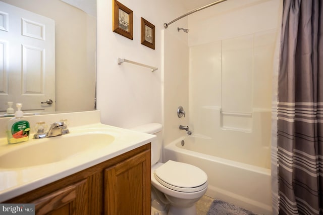 full bath with shower / bath combo, vanity, and toilet