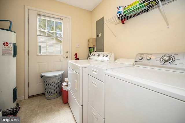laundry area with water heater, laundry area, light tile patterned flooring, independent washer and dryer, and electric panel