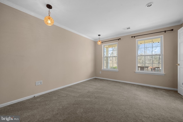 unfurnished room with visible vents, carpet flooring, baseboards, and ornamental molding