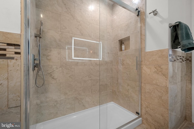 full bathroom with a stall shower