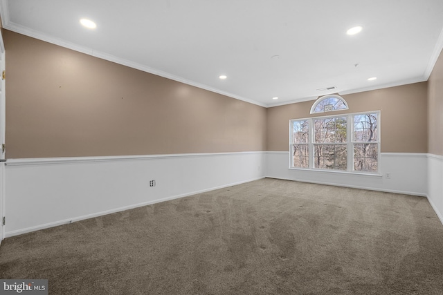 unfurnished room with visible vents, crown molding, baseboards, carpet flooring, and recessed lighting