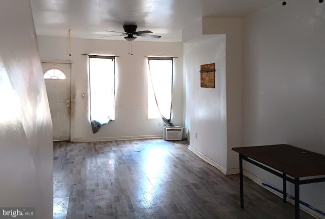 entrance foyer with wood finished floors, baseboards, and ceiling fan