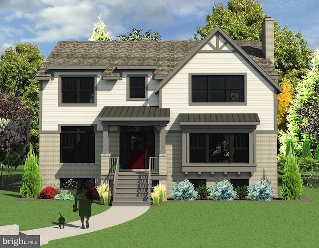 view of front facade with roof with shingles, a standing seam roof, a front lawn, brick siding, and metal roof