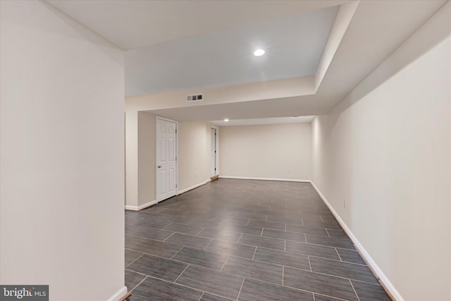 interior space with recessed lighting, visible vents, and baseboards