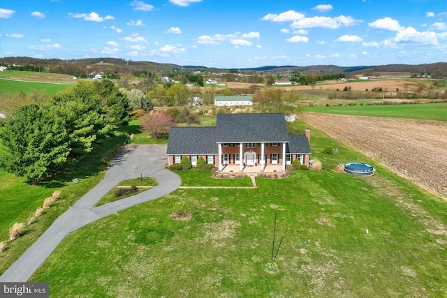 drone / aerial view with a rural view