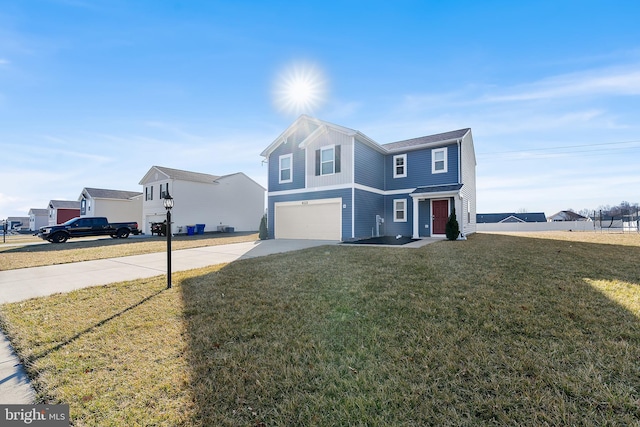 traditional home featuring concrete driveway, an attached garage, and a front lawn