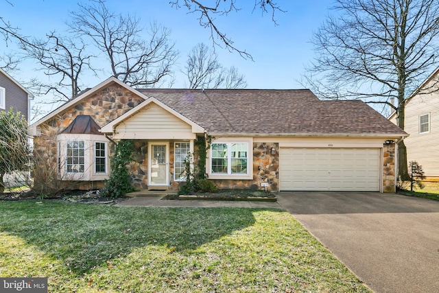 view of front facade featuring a front lawn, concrete driveway, roof with shingles, a garage, and stone siding