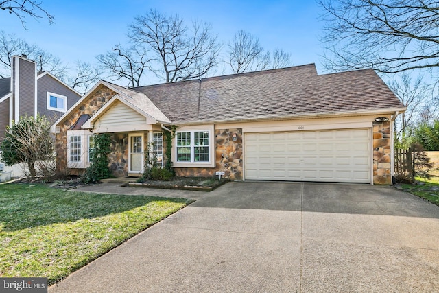 view of front of house featuring a garage, stone siding, driveway, and a shingled roof