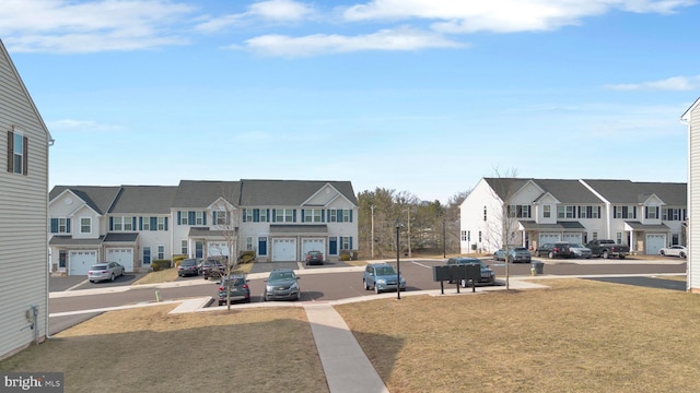 view of yard featuring a residential view