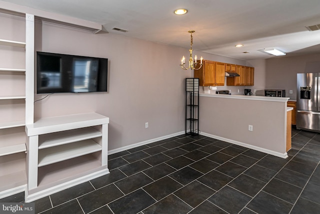 interior space with visible vents, recessed lighting, an inviting chandelier, and dark tile patterned flooring