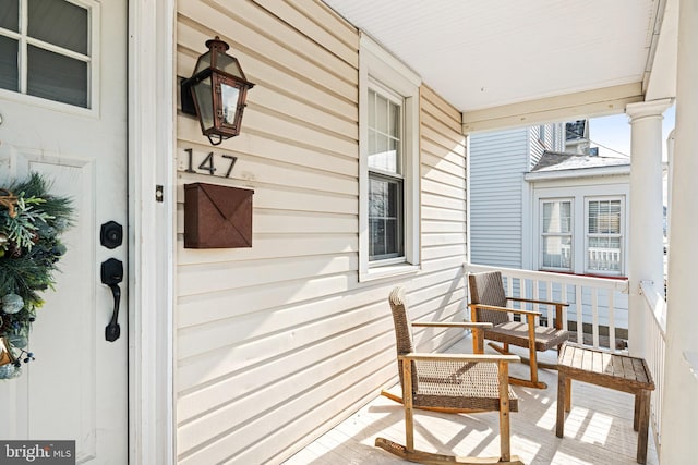 balcony featuring covered porch