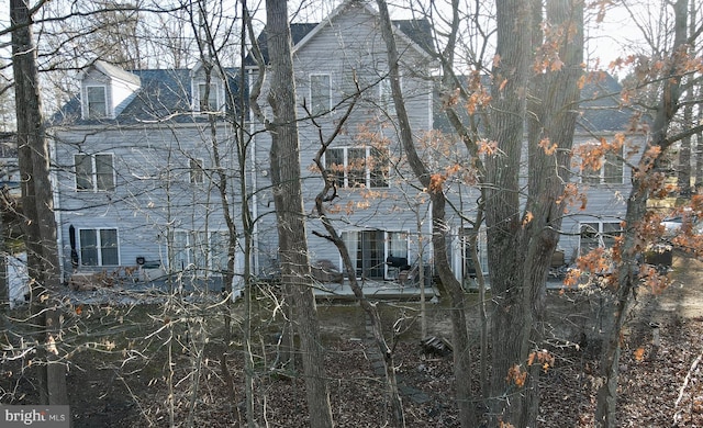 view of side of property featuring central AC unit
