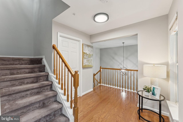 6603 Netties Ln Unit 1706, Alexandria, VA 22315 - staircase with wood finished floors and baseboards
