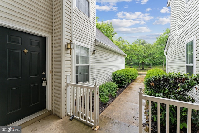 6603 Netties Ln Unit 1706, Alexandria, VA 22315 - view of exterior entry with a shingled roof