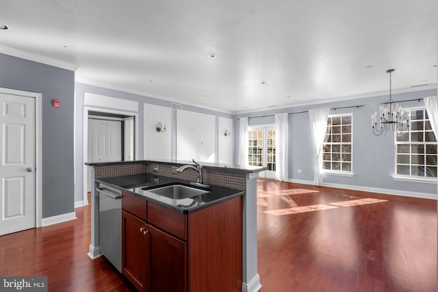 kitchen with dark wood-style floors, a sink, stainless steel dishwasher, dark countertops, and open floor plan