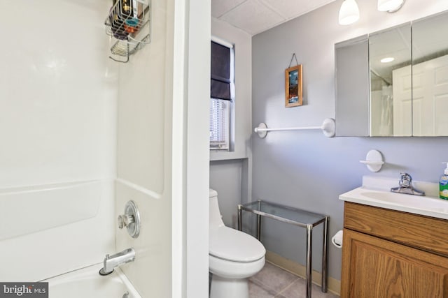 full bath with vanity, toilet, tub / shower combination, and tile patterned flooring