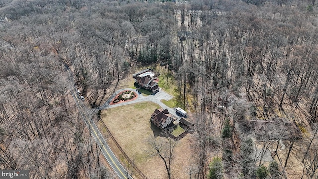 aerial view featuring a view of trees