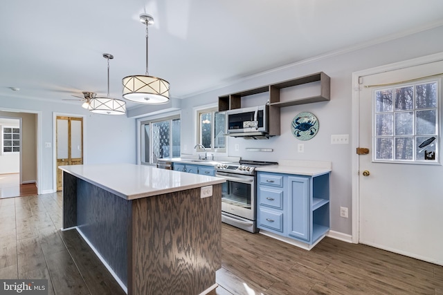 kitchen featuring dark wood-style flooring, appliances with stainless steel finishes, and open shelves