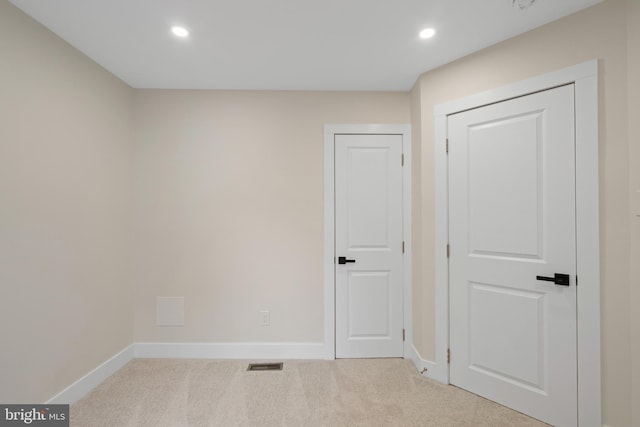 unfurnished bedroom with visible vents, recessed lighting, baseboards, and carpet floors