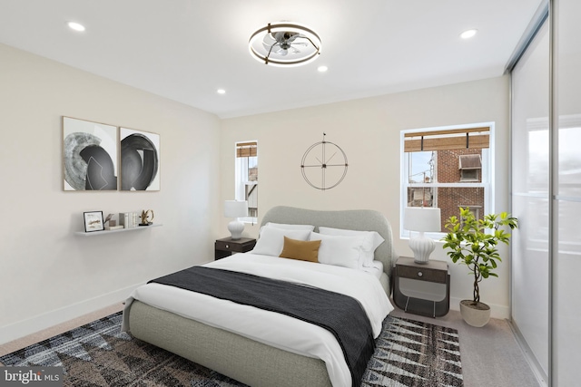 bedroom featuring carpet flooring, recessed lighting, and baseboards