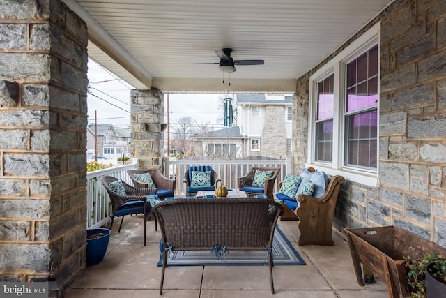 view of patio featuring ceiling fan and outdoor lounge area