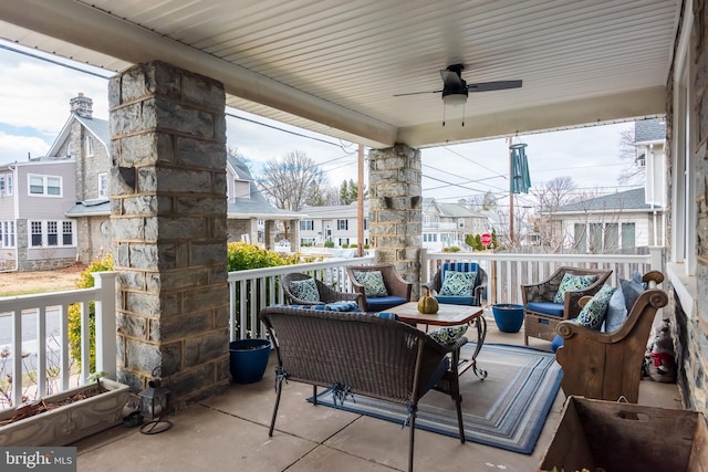 view of patio / terrace with a residential view, outdoor lounge area, and ceiling fan