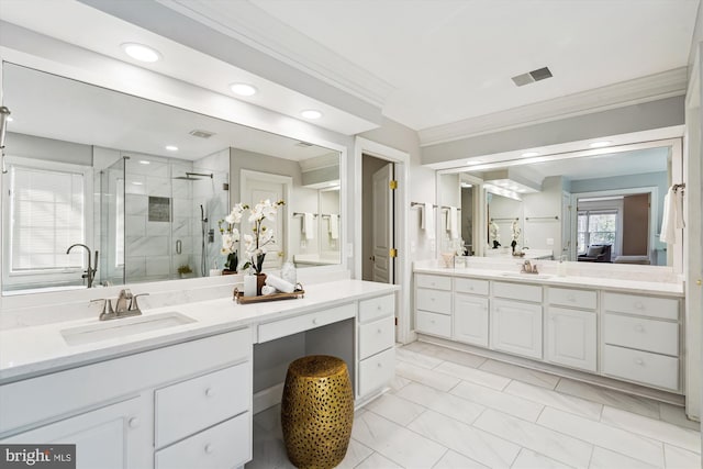 full bath with a shower stall, crown molding, visible vents, and a sink