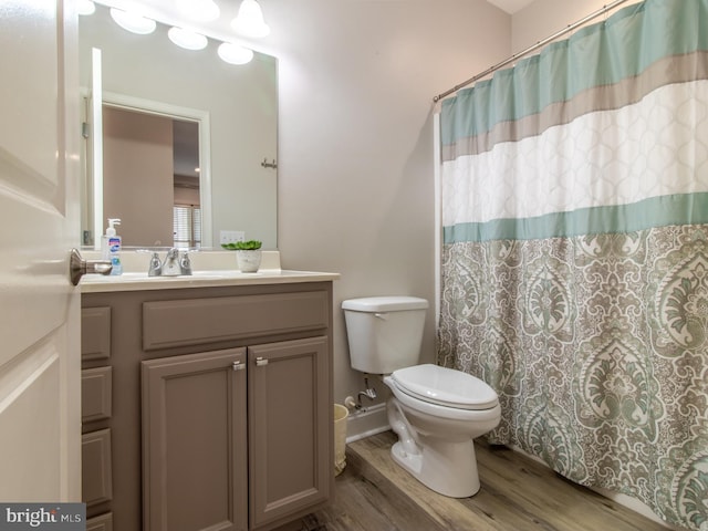 33565 Windswept Dr Unit 10201, Millsboro, DE 19966 - full bath with toilet, vanity, a shower with curtain, and wood finished floors