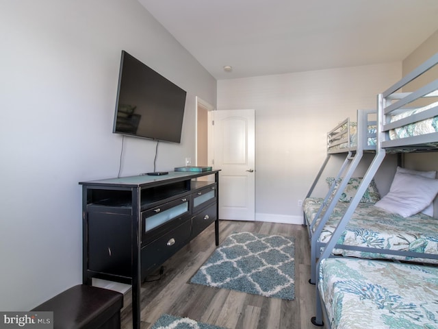 33565 Windswept Dr Unit 10201, Millsboro, DE 19966 - bedroom with baseboards and wood finished floors