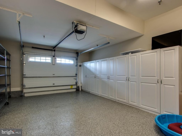 33565 Windswept Dr Unit 10201, Millsboro, DE 19966 - garage featuring a garage door opener